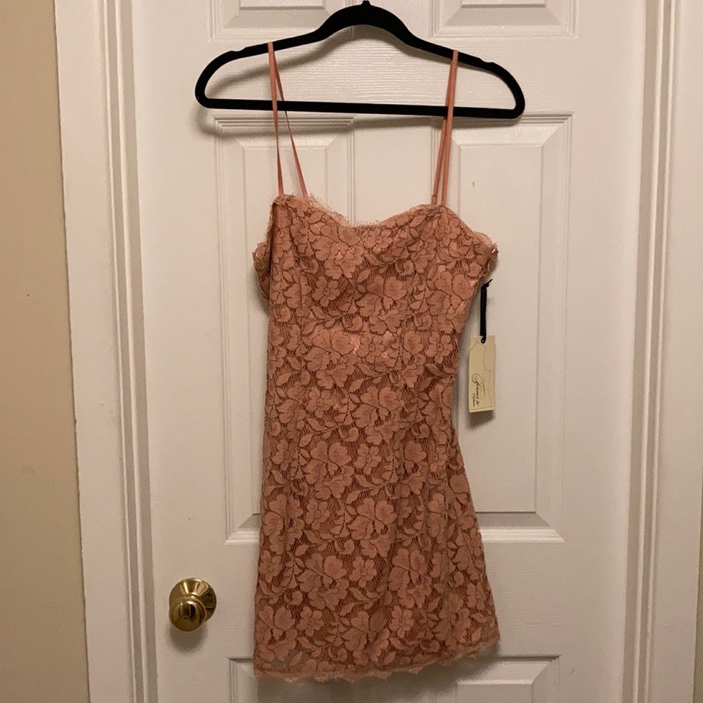 Pale pink dress.